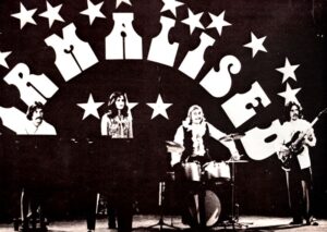 Toivo Kurmet, Melike Amjärv, Ülo Kurmet ja Paavo Soots Virmaliste vinüülplaadi kaanel. Album on välja antud 1980. aastal Stockholmis. 